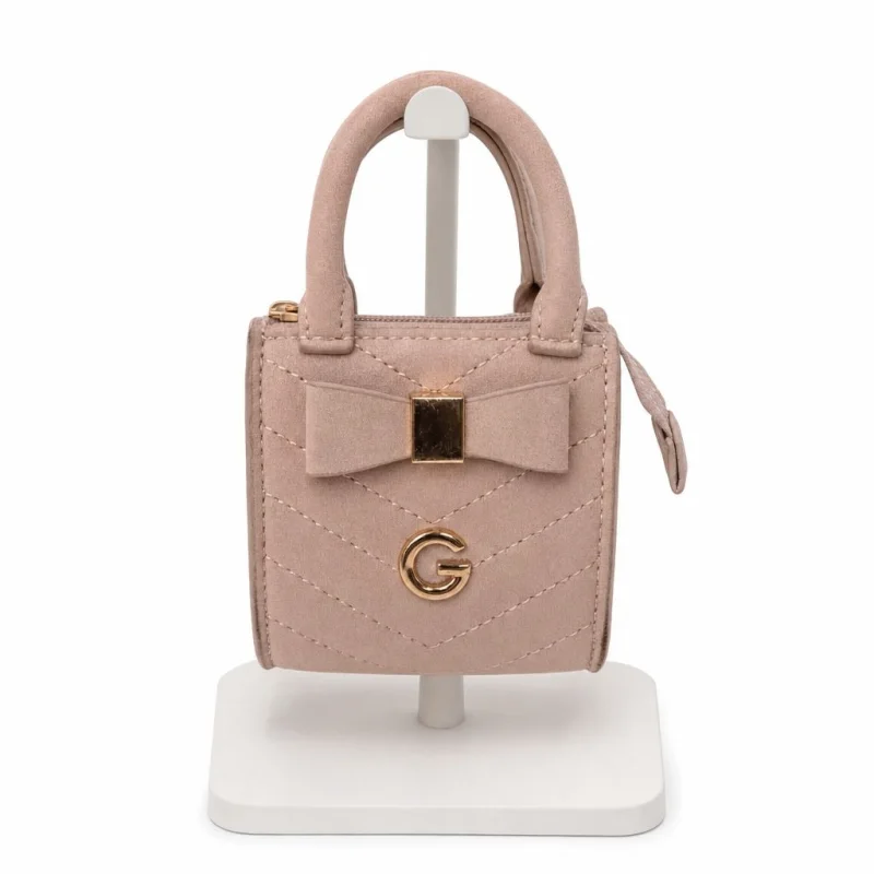 The same handbag presented upright on a display stand against a plain background.